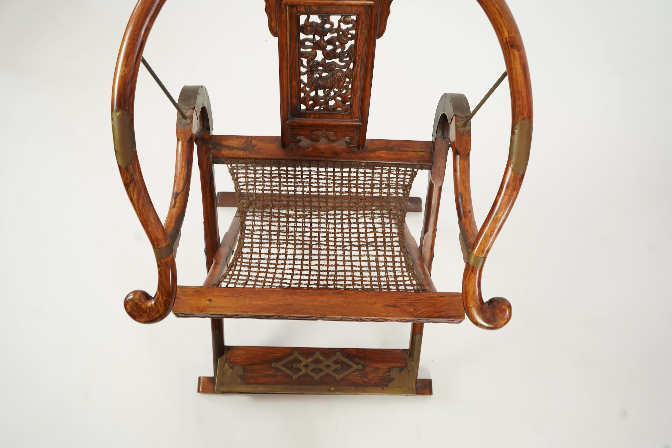 A Chinese huanghuali, hongmu and brass mounted folding hunting chair, jiaoyi, early 20th century